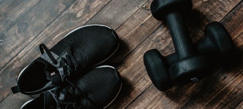 shoes and weight on a wood floor